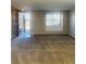 Bright living room with natural light and neutral carpet at 1963 White Top Rd., Lawrenceville, GA 30045