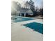 Large community pool covered for the winter, with a pool house, is ready for the upcoming season at 1963 White Top Rd., Lawrenceville, GA 30045