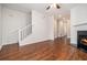 Hardwood floor living room with fireplace and staircase at 277 Ralph David Abernathy Sw Blvd, Atlanta, GA 30312