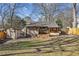 Spacious backyard with shed and wooden fence at 3001 Hilltop Dr, Atlanta, GA 30341