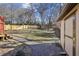 Spacious backyard with storage shed and wood fence at 3001 Hilltop Dr, Atlanta, GA 30341