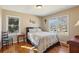 Cozy bedroom with hardwood floors and ample natural light at 3001 Hilltop Dr, Atlanta, GA 30341