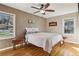 Spacious bedroom with hardwood floors and ceiling fan at 3001 Hilltop Dr, Atlanta, GA 30341