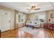 Bright living room with hardwood floors and a view of the front yard at 3001 Hilltop Dr, Atlanta, GA 30341