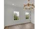 Bright bedroom with hardwood floors and large windows at 350 Sugarview Rd, Sugar Hill, GA 30518