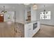 Kitchen island with granite countertop and built-in oven at 350 Sugarview Rd, Sugar Hill, GA 30518