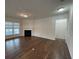 Bright living room with hardwood floors and fireplace at 4338 Braden Nw Ln, Kennesaw, GA 30144