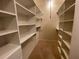 Spacious walk-in closet with ample shelving at 4338 Braden Nw Ln, Kennesaw, GA 30144