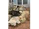 Charming stone water feature in backyard at 4338 Braden Nw Ln, Kennesaw, GA 30144