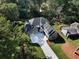 Aerial view of two story house with driveway at 754 Moon Road, Lawrenceville, GA 30046