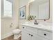 Modern powder room with white vanity and floating sink at 754 Moon Rd, Lawrenceville, GA 30046