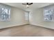 Spacious bedroom with hardwood floors and large windows at 754 Moon Road, Lawrenceville, GA 30046