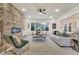 Living room featuring a cozy fireplace and ample natural light at 754 Moon Rd, Lawrenceville, GA 30046