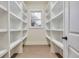 Bright and spacious pantry with floor to ceiling shelving at 754 Moon Road, Lawrenceville, GA 30046