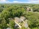 Aerial view of two houses nestled in a lush, tree-lined neighborhood at 1546 Richland Sw Rd, Atlanta, GA 30311
