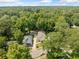 Aerial view of two houses on a tree-lined street in a residential area at 1546 Richland Sw Rd, Atlanta, GA 30311