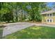 Large backyard with a concrete patio, perfect for outdoor activities at 1546 Richland Sw Rd, Atlanta, GA 30311