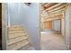 Unfinished basement with exposed framing and stairs at 1546 Richland Sw Rd, Atlanta, GA 30311