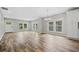 Open concept dining area with hardwood floors and chandelier at 1546 Richland Sw Rd, Atlanta, GA 30311