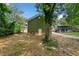 House exterior showcasing a side view with mature trees at 1546 Richland Sw Rd, Atlanta, GA 30311