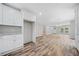 Modern kitchen with white cabinets and granite countertops at 1546 Richland Sw Rd, Atlanta, GA 30311