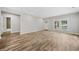 Spacious living room featuring wood-look floors and an abundance of natural light at 1546 Richland Sw Rd, Atlanta, GA 30311