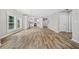 Open concept living space with hardwood floors, kitchen, and dining area at 1546 Richland Sw Rd, Atlanta, GA 30311