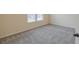 Bedroom featuring carpeted floors, neutral walls and a window at 3535 Clarecastle Dr, Buford, GA 30519