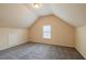 A cozy bedroom featuring neutral paint, carpet, and ample natural light, creating a serene and inviting atmosphere at 3535 Clarecastle Dr, Buford, GA 30519