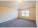 Bedroom featuring high ceilings and a large window at 3535 Clarecastle Dr, Buford, GA 30519