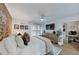 Main bedroom with a king-size bed, walk-in closet and an accent wall at 100 Verlaine Nw Pl, Atlanta, GA 30327