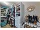 Large walk-in closet with shelving and hanging space at 100 Verlaine Nw Pl, Atlanta, GA 30327