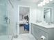 Modern bathroom with double vanity and glass shower at 1482 Andrews Nw St, Atlanta, GA 30314