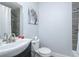 Clean bathroom with shower/tub combo and updated vanity at 1482 Andrews Nw St, Atlanta, GA 30314