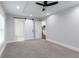 Large bedroom with ceiling fan and barn door at 1482 Andrews Nw St, Atlanta, GA 30314