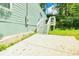 Home's exterior features light teal siding and a patio at 1482 Andrews Nw St, Atlanta, GA 30314