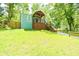 Cute house with a large green lawn and wooden fence at 1482 Andrews Nw St, Atlanta, GA 30314