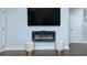 Modern electric fireplace with stylish ottomans at 1482 Andrews Nw St, Atlanta, GA 30314