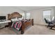 Spacious main bedroom with large bed and home office area at 2540 Canning View Ave, Lawrenceville, GA 30044