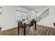 Dining area with glass table and four chairs near kitchen at 2540 Canning View Ave, Lawrenceville, GA 30044