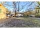 Spacious backyard with trees and grassy area at 3489 Pine Forest Se Dr, Atlanta, GA 30354