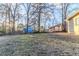 Large backyard with trees and grassy area at 3489 Pine Forest Se Dr, Atlanta, GA 30354