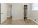 Well-lit bedroom with neutral walls and carpet at 3489 Pine Forest Se Dr, Atlanta, GA 30354