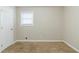 Simple bedroom with neutral walls and carpet at 3489 Pine Forest Se Dr, Atlanta, GA 30354