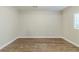 Simple bedroom with hardwood floors and neutral walls at 3489 Pine Forest Se Dr, Atlanta, GA 30354