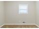 Small bedroom with carpet, window, and neutral walls at 3489 Pine Forest Se Dr, Atlanta, GA 30354