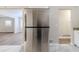 Stainless steel refrigerator in a kitchen with light flooring at 3489 Pine Forest Se Dr, Atlanta, GA 30354