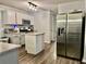 Kitchen boasting stainless steel appliances and an island at 3877 Oakman Pl, Fairburn, GA 30213