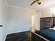 Bedroom with dark hardwood floors and ceiling fan at 511 Laird Rd, Hiram, GA 30141