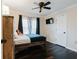 Bedroom with dark hardwood floors and ceiling fan at 511 Laird Rd, Hiram, GA 30141